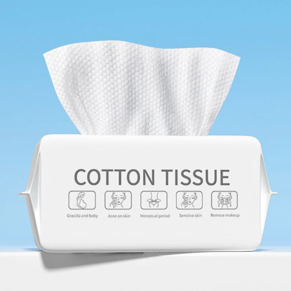 A white pack of cotton tissue with icons indicating uses like for baby, acne, menstrual period, sensitive skin, and makeup re