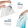 Silver chrome hook hangers and a velvet hanger gripping a white shirt and a light blue t-shirt.