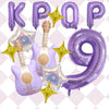 A set of purple balloons shaped like the letters KPOP and the number 9, decorated with golden star accents.