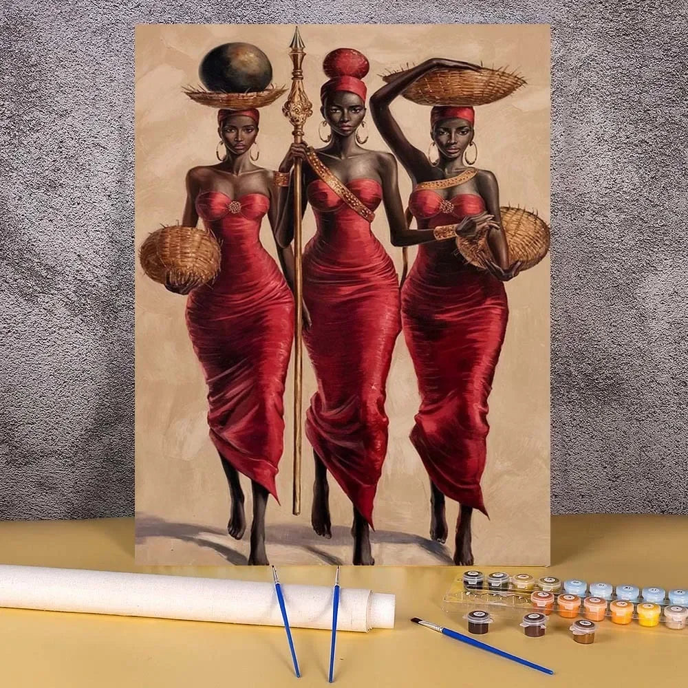 Two women in red dresses hold woven hats and spears against a light background.