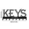 Black decorative metal key holder rack with hooks, measuring 15mm thick and 260mm long.