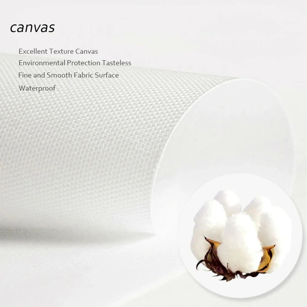 A close-up view of a white canvas fabric texture with a piece of natural brown material resting on it.
