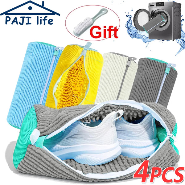 Four reusable grey shoe cleaning bags filled with yellow and white cleaning brushes