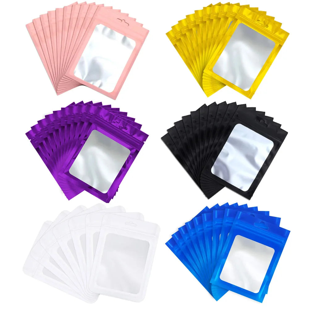 A collection of 50 jewelry display pouches in various colors including pink, yellow, purple, black, and blue.