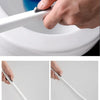 A hand is using a white cleaning brush to replace a toilet part, demonstrating one-click replacement and easy installation.