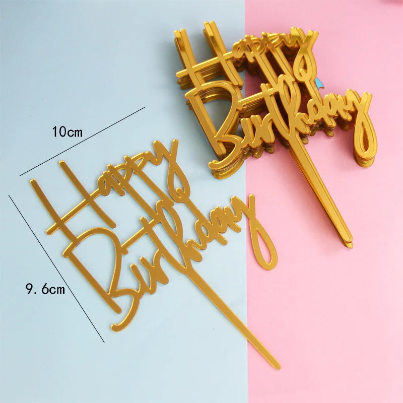Gold acrylic birthday cake toppers spelling out Happy Birthday