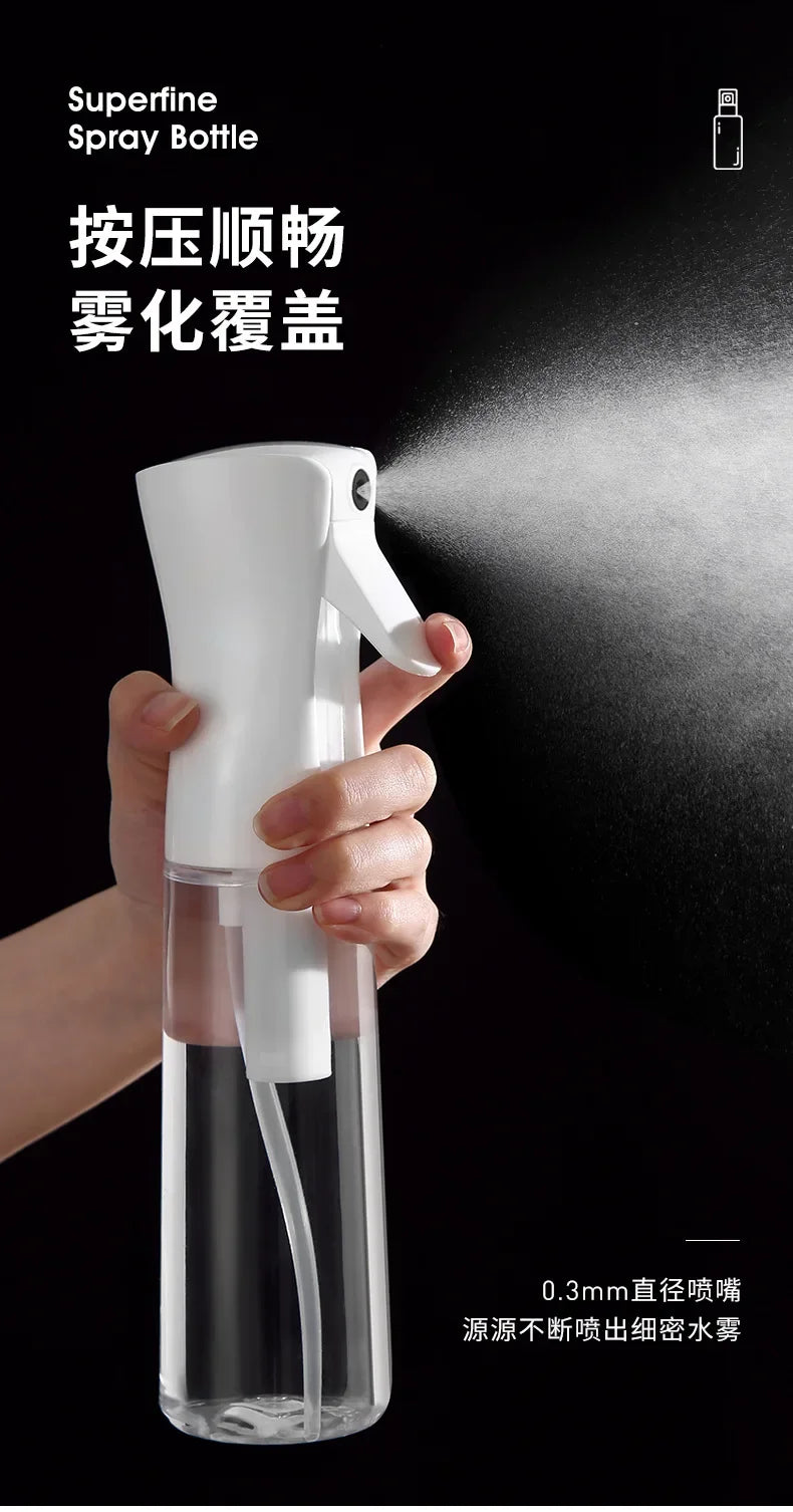 A hand is holding a white spray bottle, demonstrating the misting function. The bottle contains liquid and is being used to c