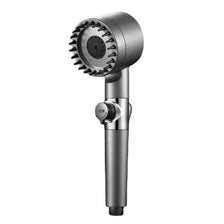 A silver shower head featuring a multi-mode filter with massage and rain features.