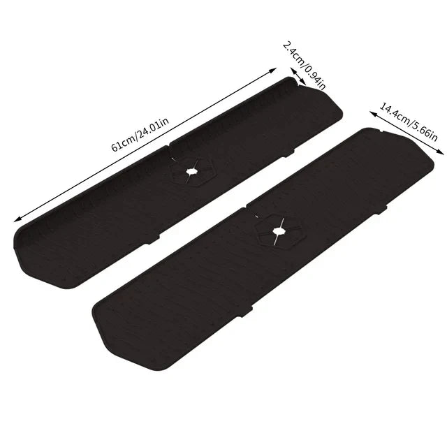 A black silicone kitchen sink drain mat shown from above with dimensions marked.