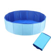 A blue portable folding foot bath basin with a removable inner liner is shown.