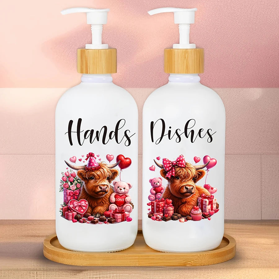 Two white soap dispensers with wooden caps and labels featuring illustrations of farm cows and red hearts