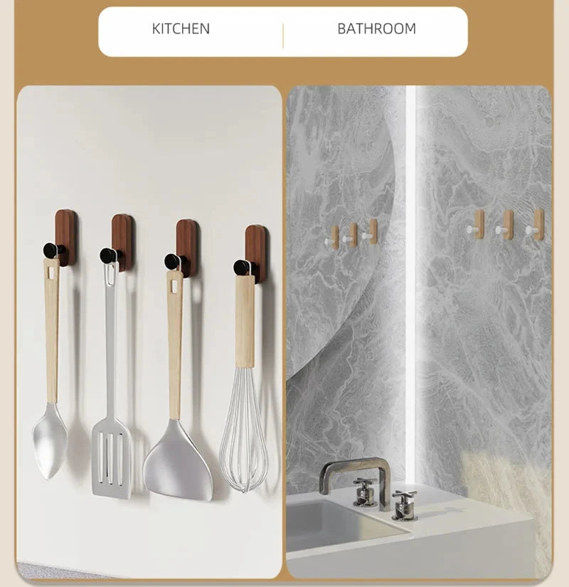 A collection of walnut wood wall hooks and silicone spatulas displayed in a kitchen context.