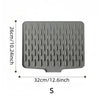 Gray silicone drain mat with a perforated surface, measuring 32cm by 26cm.