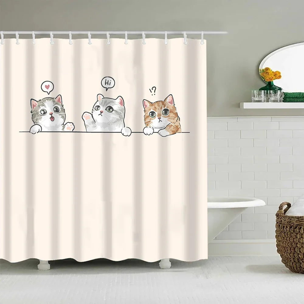 A shower curtain featuring cute cartoon cats with speech bubbles.