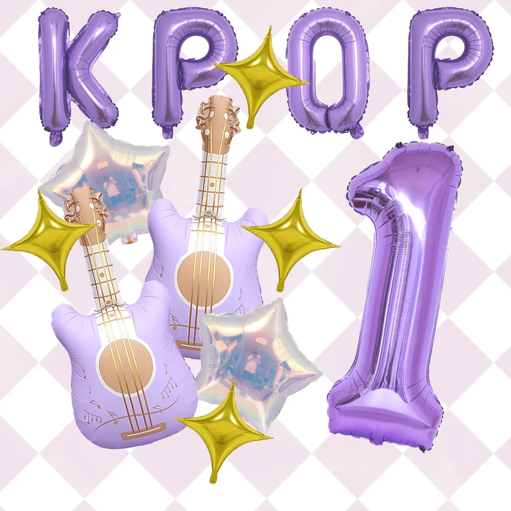 A set of purple balloons shaped like letters and numbers, including a large number one and guitars with golden star accents.