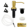A brass liquid soap dispenser featuring a pump mechanism and a clear silicone tube for dispensing soap.