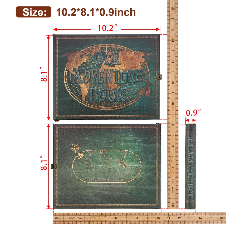 A set of two vintage-style photo albums or scrapbooks with dark green covers and gold accents.