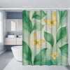 A floral shower curtain featuring green leaves and yellow butterflies in a light mint background.