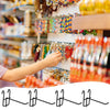 A hand is placing a hook onto a heavy-duty mesh grid display for retail organization.