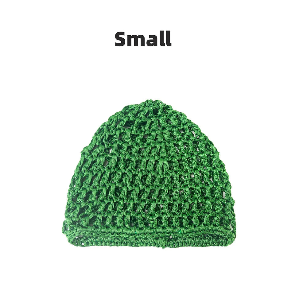 A small, hand-crocheted mesh hair net cap in green.