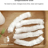White disposable shower caps for hair protection laid out on a wooden board.