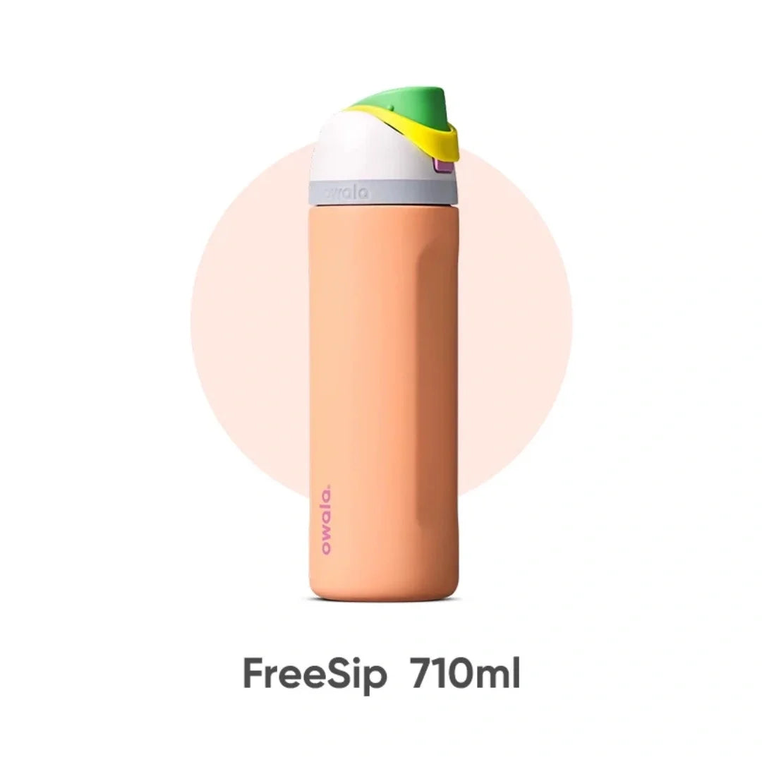 An orange insulated water bottle with a green lid and straw, labeled FreeSip 710ml.