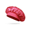 A vibrant red satin sleep bonnet for toddlers, shown from the side.