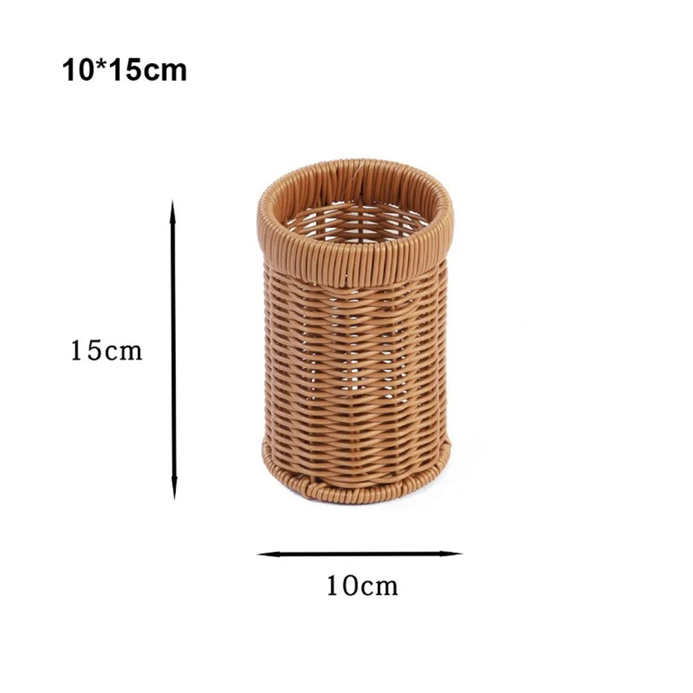 A cylindrical handwoven rattan serving basket with a natural brown color.