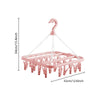 Pink multi-clip clothes drying rack with a hook and a rectangular drying surface