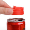 A hand is shown pressing a red plastic seal onto the opening of a red beverage can.