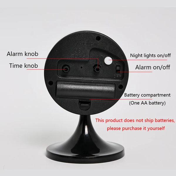 A black Nordic Metal round table alarm clock featuring an alarm knob, time knob, and night lights on/off switch.