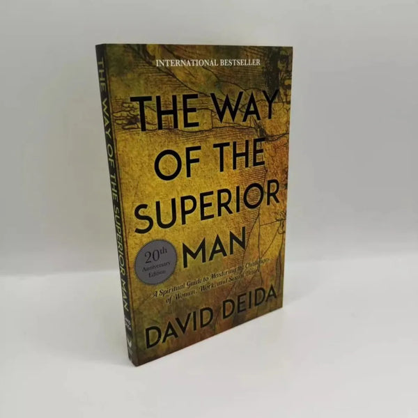 A hardcover book titled The Way of the Superior Man by David Deida with a textured yellow-green cover.