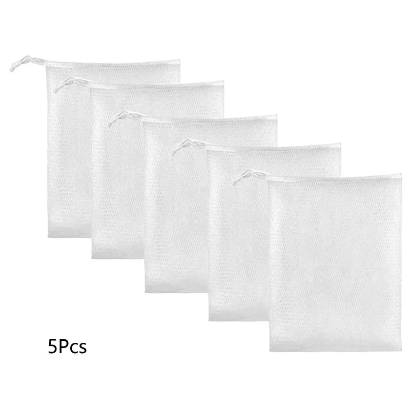 Five white mesh net bags for bulk soap or shower use