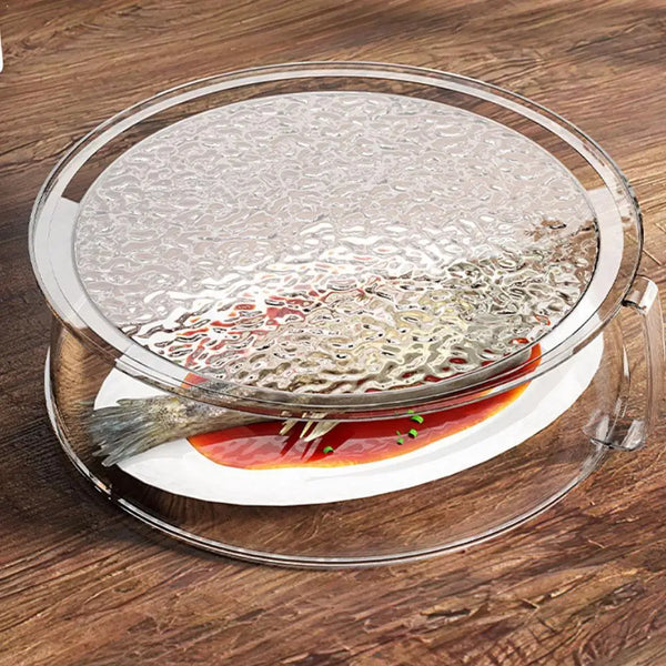 Clear microwave splatter guard with a heat-resistant handle placed over a piece of fish