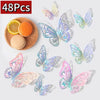 48 pieces of colorful 3D decorative butterfly wall stickers displayed on a wooden surface.