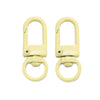 A pair of light yellow alloy snap lobster clasp hooks for jewelry making