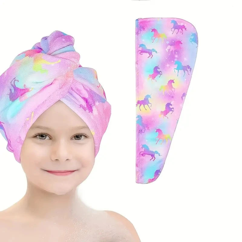 A pink microfiber hair drying cap set featuring a vibrant unicorn print for children.