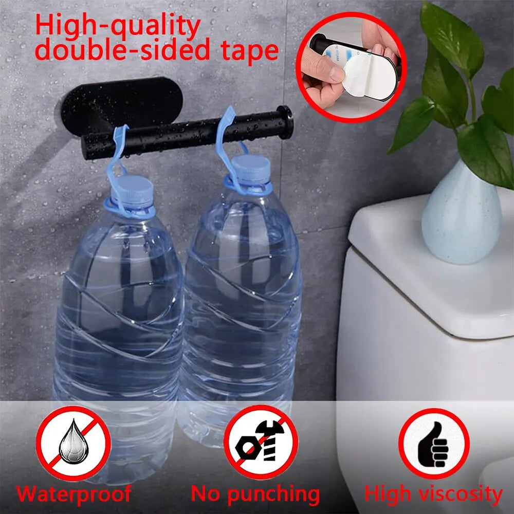 High-quality double-sided tape used to attach a paper towel holder to a bottle.
