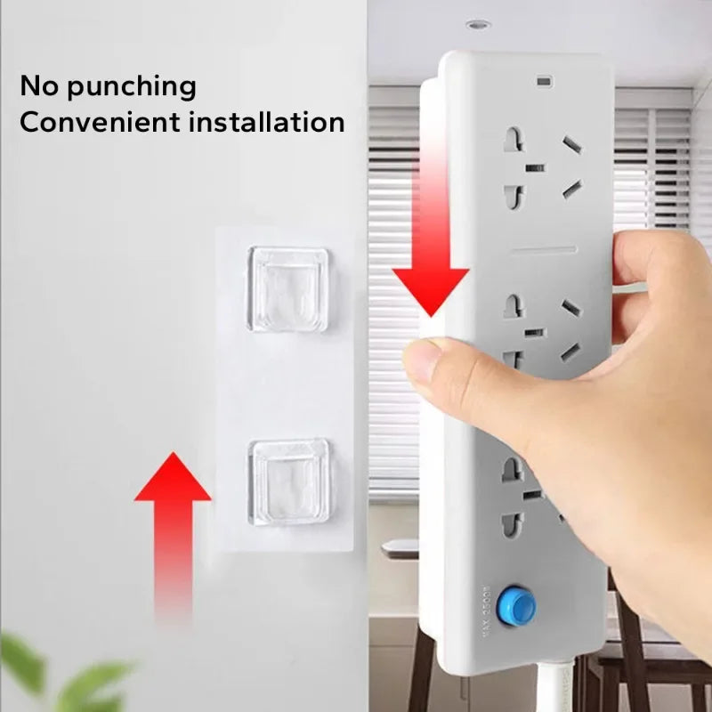 A hand installs a white adhesive wall hook onto a white door, demonstrating convenient installation.