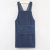 A dark blue striped denim apron hanging on a wooden hanger.