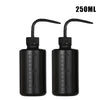 A pair of black squeeze bottles with measurement marks for tattoo solutions, labeled 250ml.