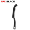 A black durable hard-bristle crevice cleaning brush.
