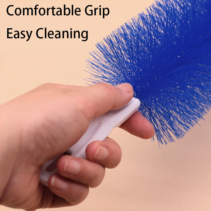 A hand holds a blue cleaning brush with a comfortable grip, demonstrating easy cleaning.