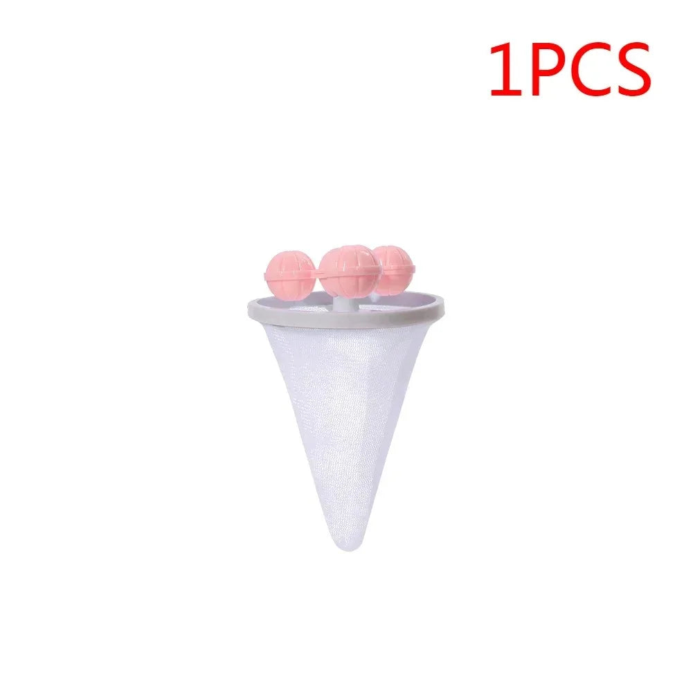 A single pink floating pet hair remover tool with a conical tip.