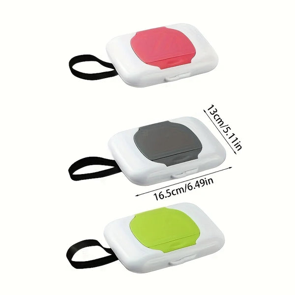 Three reusable wipe dispensers in pink, gray, and lime green colors shown from above.