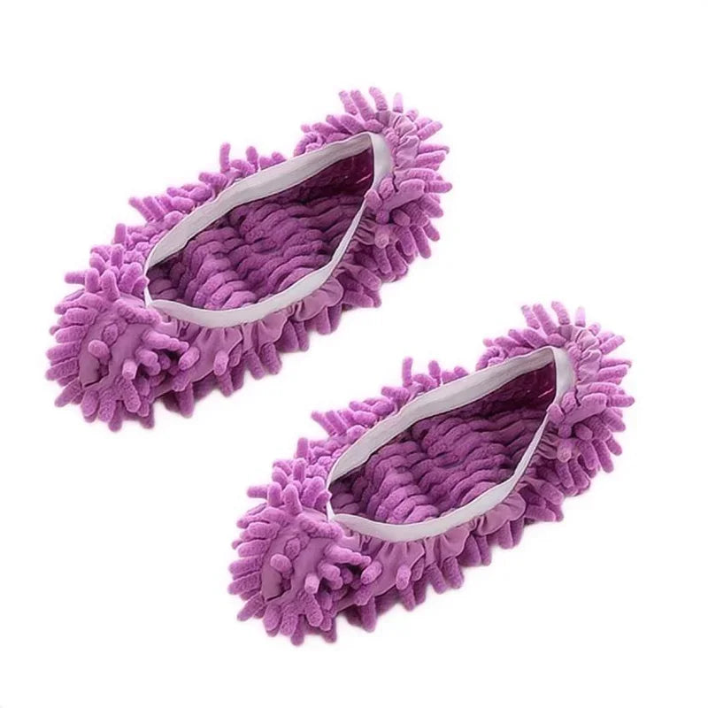 Pair of purple, fuzzy dust-absorbing slippers designed for floor cleaning.