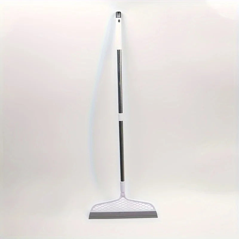 A long, slender white and silver ergonomic broom and scraper set against a plain white background.