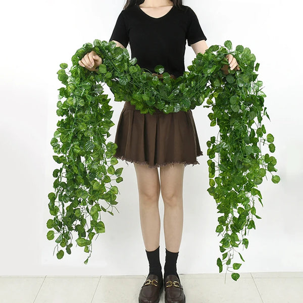 Artificial ivy green garland vine draped around a person for home decor