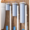 A display showing different sizes of disposable toilet brush cleaning kits, labeled 6pcs, 12pcs, and 18pcs.