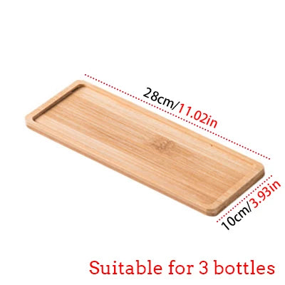 A wooden rectangular bottle holder designed to hold three bottles, measuring 28cm long and 10cm wide.